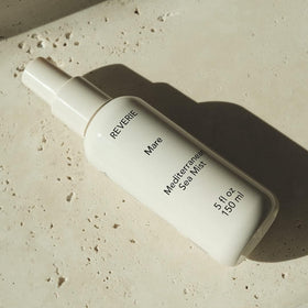 REVERIE Natural Mare Sea Mist bottle near roots for instant volume