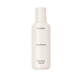 REVERIE Nourishing Conditioner bottle showcases color-safe, hydrating design.
