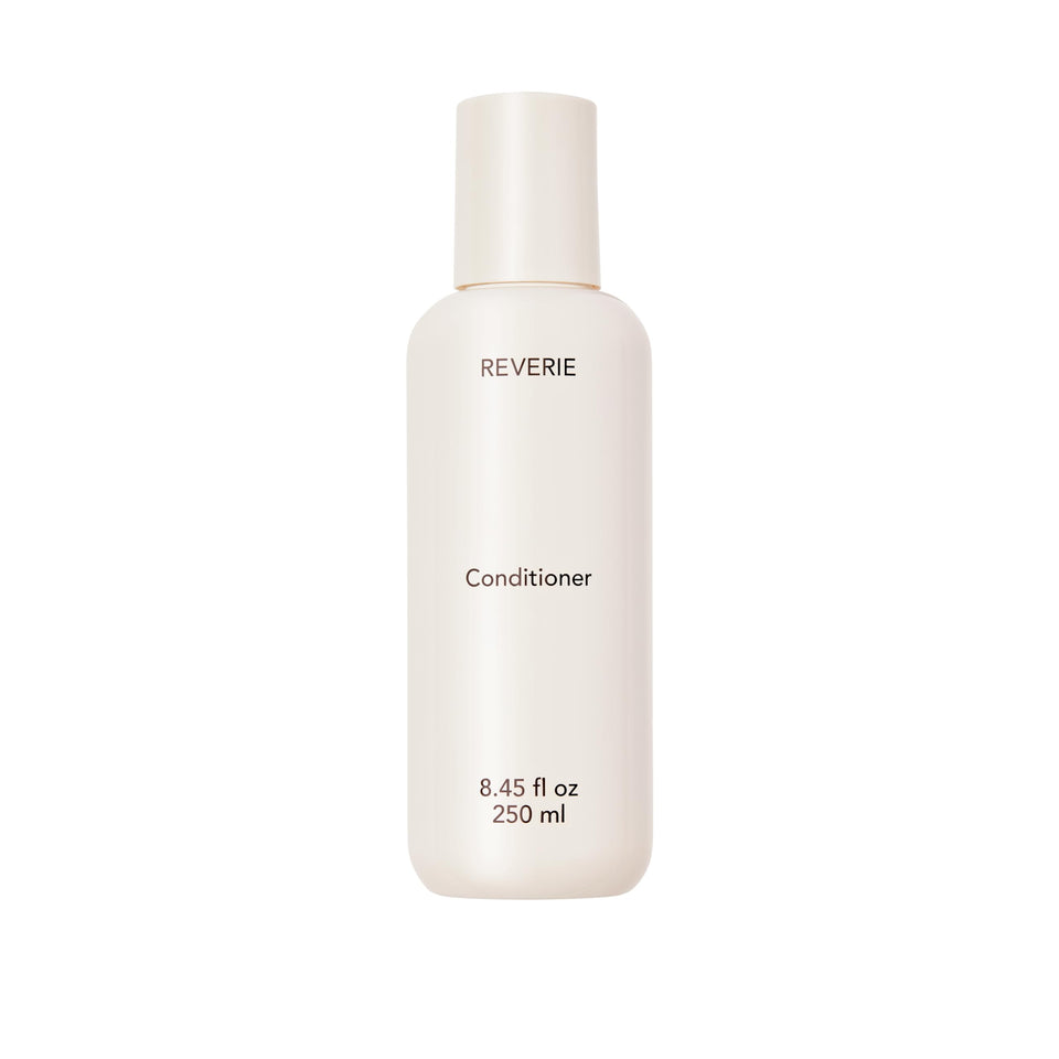 REVERIE Nourishing Conditioner bottle showcases color-safe, hydrating design.