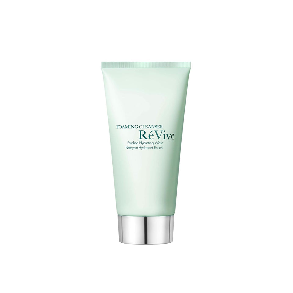RéVive Foaming Facial Cleanser bottle, premium daily cleanser for hydrated skin.