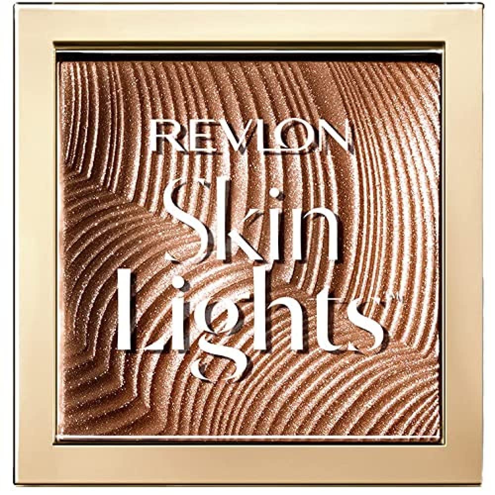 Revlon Skinlights Prismatic Bronzer Sunkissed Beam closeup reveals crystal pigments for a natural glow.