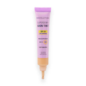 Revolution Beauty London Superdewy SPF 30 skin tint bottle shows mineral formula and glow.