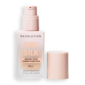 Revolution Skin Silk bottle close-up showing a lightweight radiant finish.