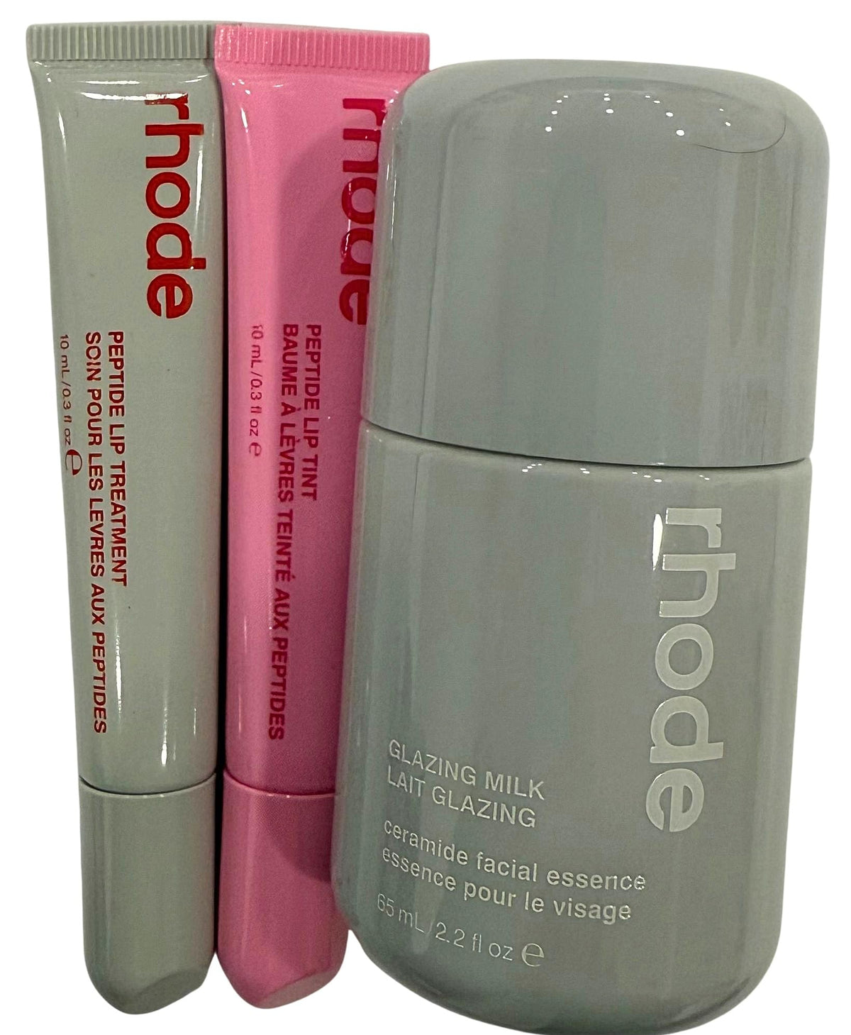 Rhode Glazing Milk bottle pour highlights ceramide hydration and priming for radiant skin.