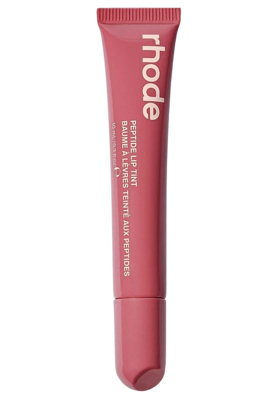 Rhode Gloss Lip Tint Salty Tan application adds moisturizing color and high shine.