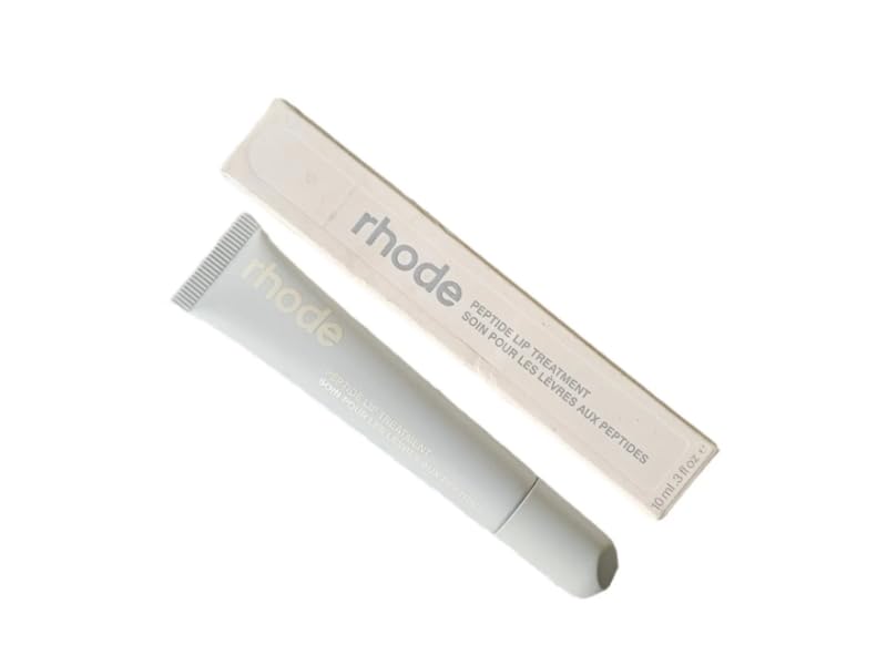 Rhode Lip Treatment Salted Caramel bottle delivers nourished, glossy lips.