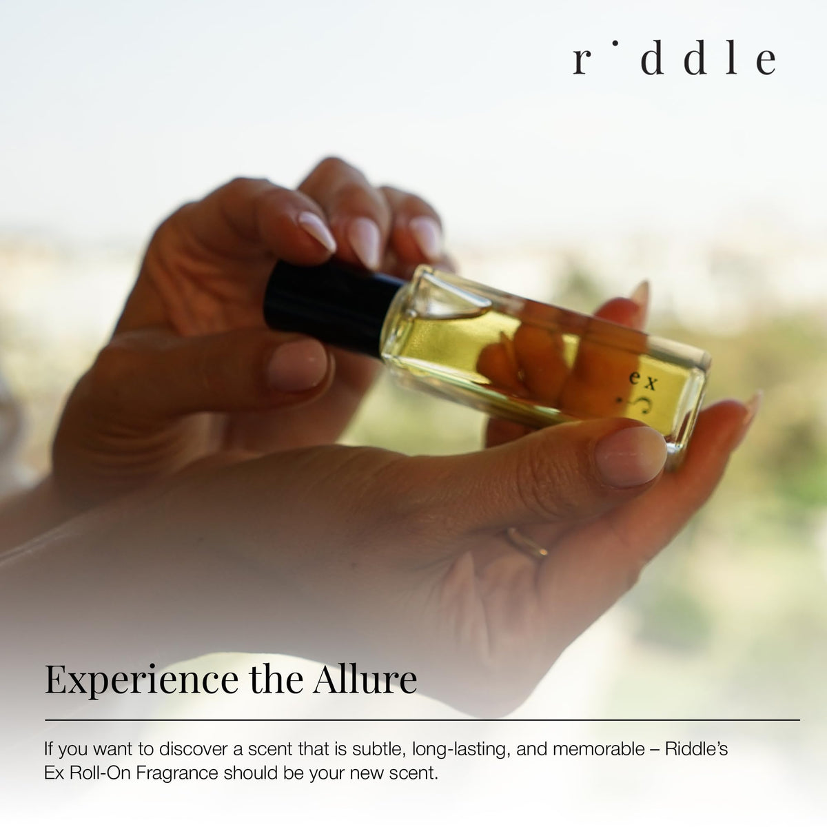 Riddle Ex Roll-On Perfume close-up with cardamom and sandalwood notes