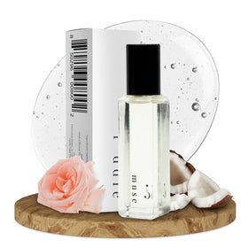 Riddle Oil Muse Roll On bottle closeup for fruity citrus floral scent