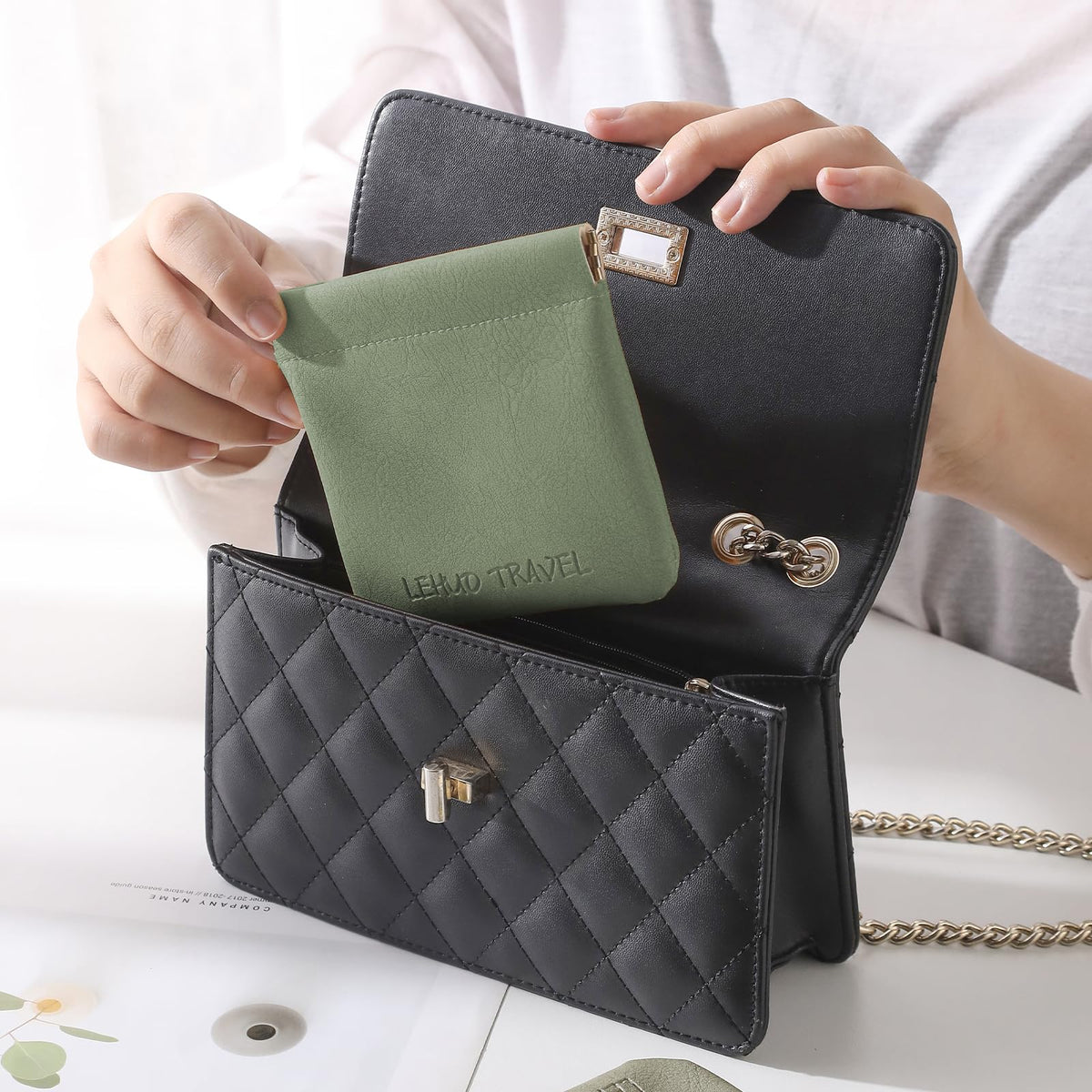 Compact organizer for purse, pocket, or backpack with versatile storage.