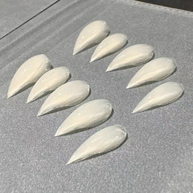 RIICFDD handmade press-on nails with unique crafted shape.