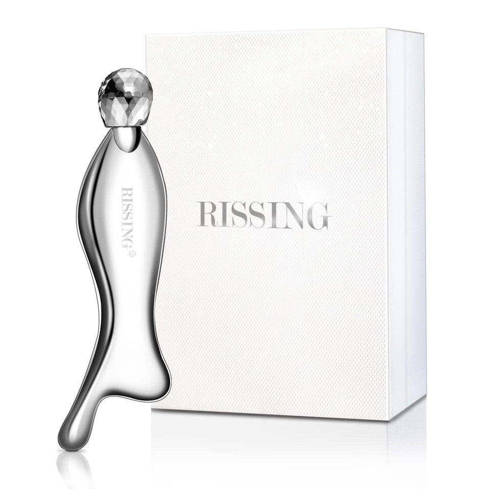 RISSING 4-in-1 gua sha tool close-up in polished stainless steel for precise massage