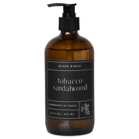 River Birch Tobacco Sandalwood hand soap bottle with rich scent and moisturizing formula.