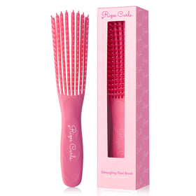 Rizos Curls Detangling Flexi Brush pink close-up showing gentle detangling