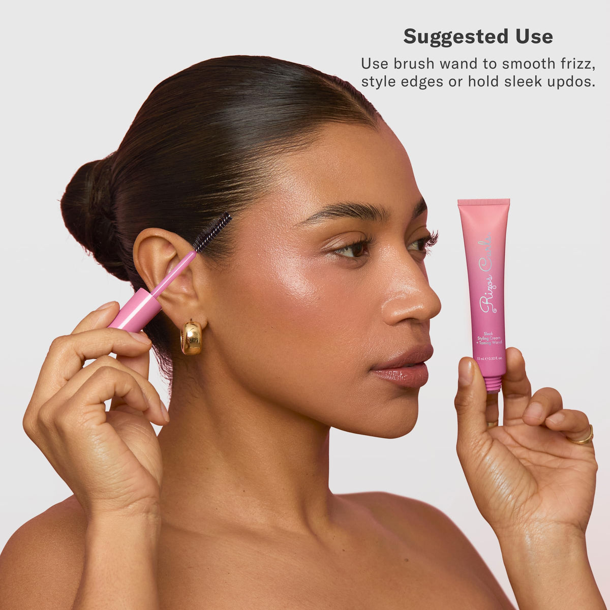 Rizos Curls Sleek Styling Cream with wand taming flyaways for sleek finish