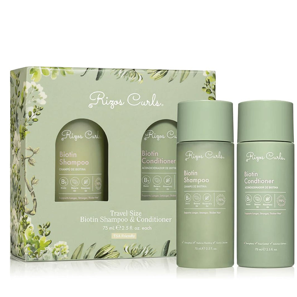 Rizos Curls travel biotin wash bundle packaging for on-the-go cleansing.
