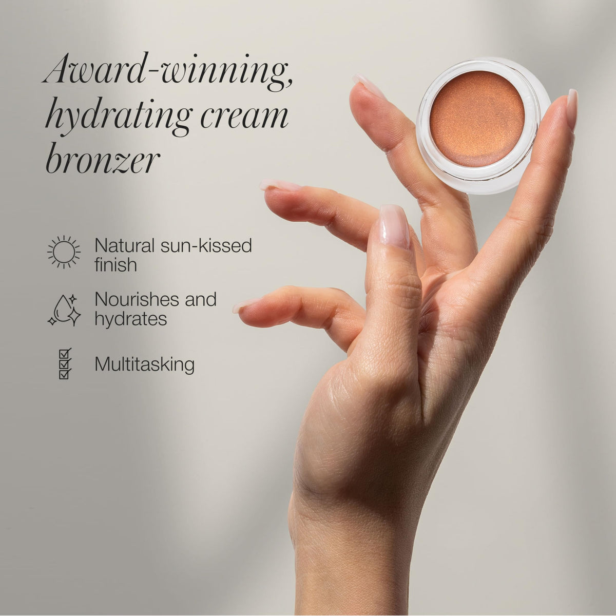 RMS Beauty Buriti bronzer swatch on cheek reveals warm natural glow
