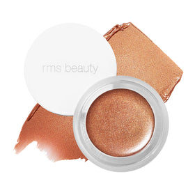 RMS Beauty Buriti bronzer tube close-up showing creamy texture and luminous finish