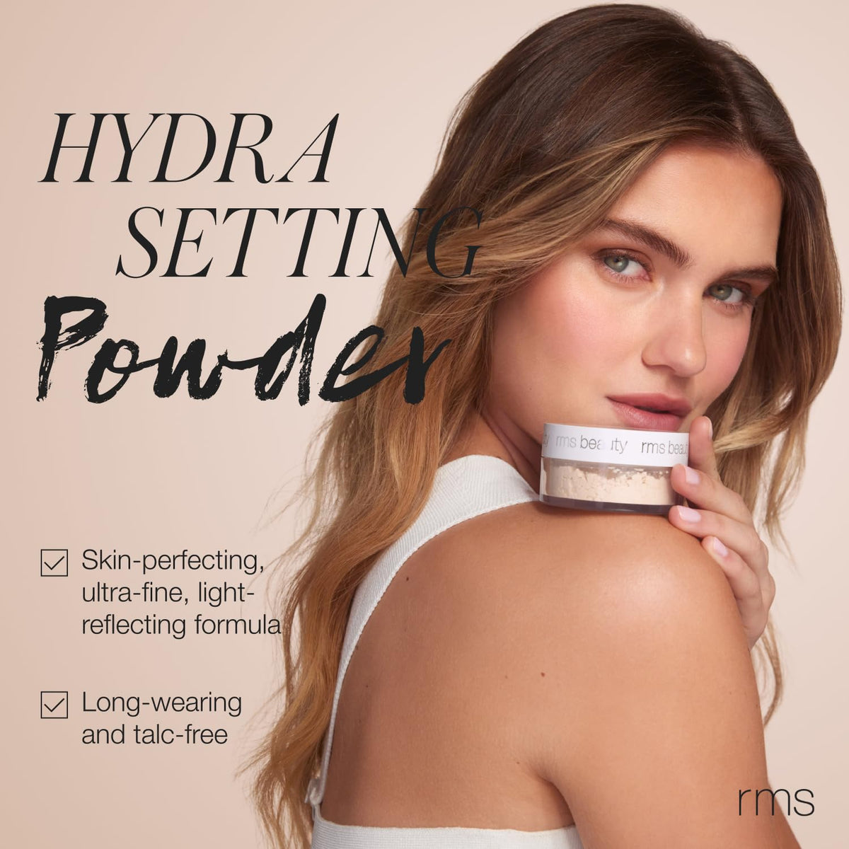 RMS Beauty Hydra Setting Powder texture swatch showing soft-focus blur.