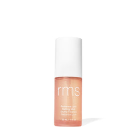 RMS Beauty Radiance Lock Setting Mist bottle close-up, showing dewy makeup hold