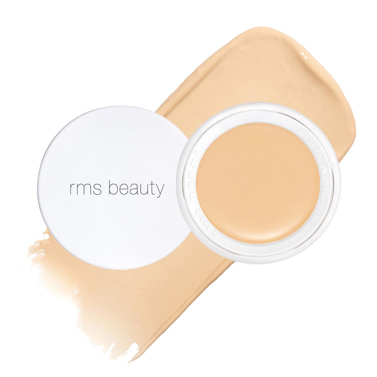 RMS Beauty Un Cover-Up No.11 jar open shows creamy concealer for buildable coverage.