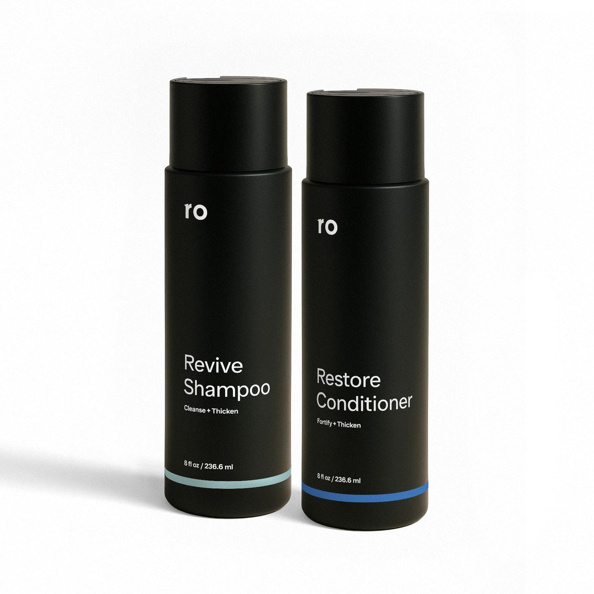 Ro Men's Revive Shampoo bottle closeup showing refreshing minty clarifying action
