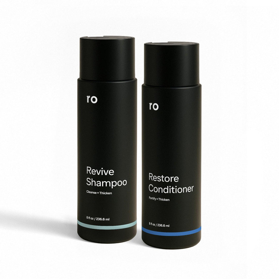 Ro Men's Revive Shampoo bottle closeup showing refreshing minty clarifying action