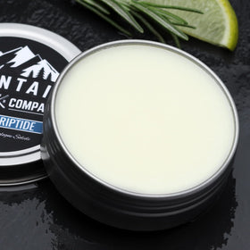 Rocky Mountain Solid Cologne Coastal Riptide tin back view shows durable packaging.