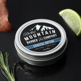 Rocky Mountain Solid Cologne Coastal Riptide tin front view highlight compact packaging.