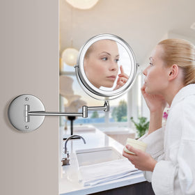 Sleek Rocollos chrome mirror adds style to any vanity or bathroom.