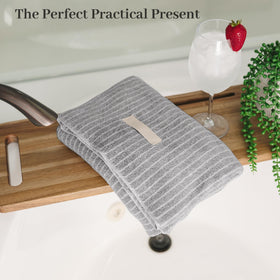 ROLSHOL towel with elastic band securely wrapping hair while moving
