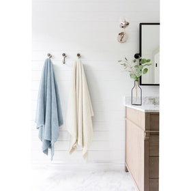 Wrap around damp hair and secure for hands-free drying
