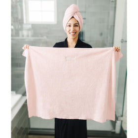 ROLSHOL hair towel wrap pink on bathroom mirror demonstrates compact storage