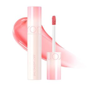 rom&nd Juicy Lasting Tint 31 Bare Apricot cap close-up, vibrant color preview.