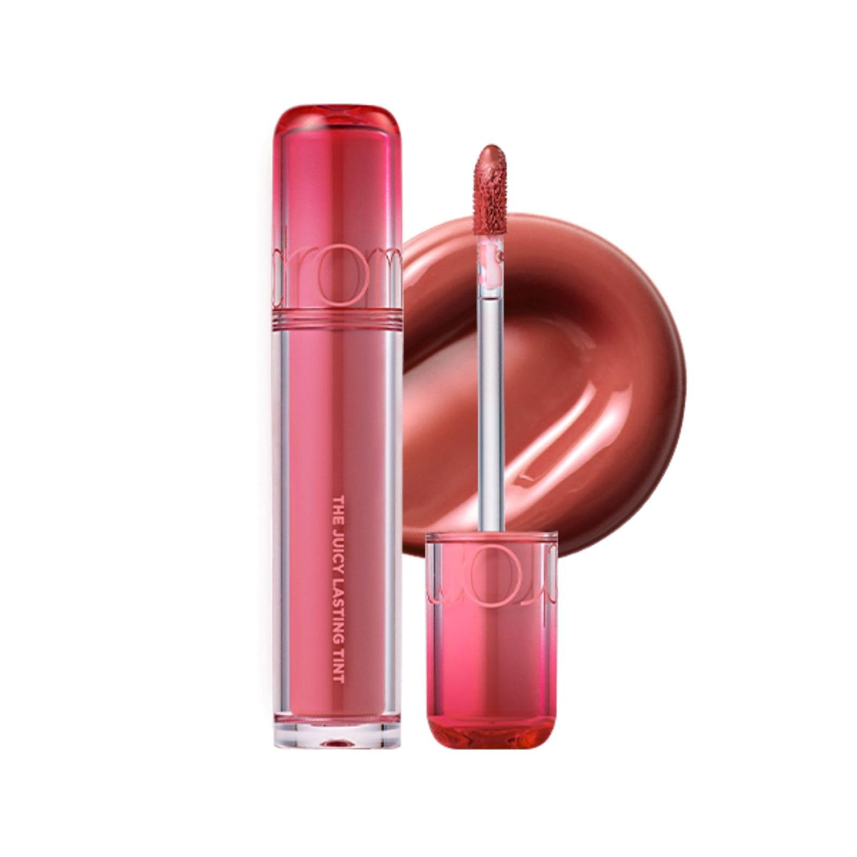 romnd The Juicy Lasting Tint Almond Rose gloss bottle showing a hydrated MLBB color