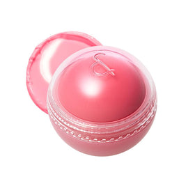 rom&nd JUICY ROLL CHEEK 03 White Peach bottle with a soft peach glow for a dewy finish.