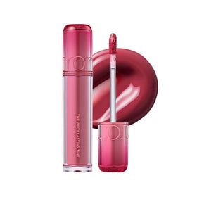 rom&nd The Juicy Lasting Tint 04 Fig Fig glassy shine close-up for luminous lips.
