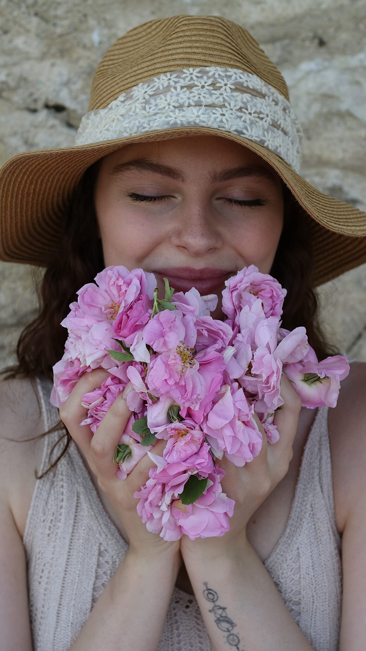 Rosense bottle highlighting ingredients: 100% pure rosewater with no additives