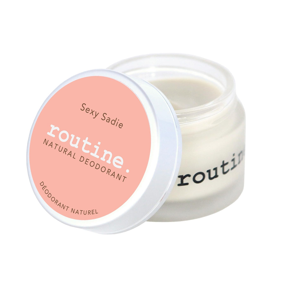 Routine natural deodorant cream jar showing smooth texture for easy underarm application.
