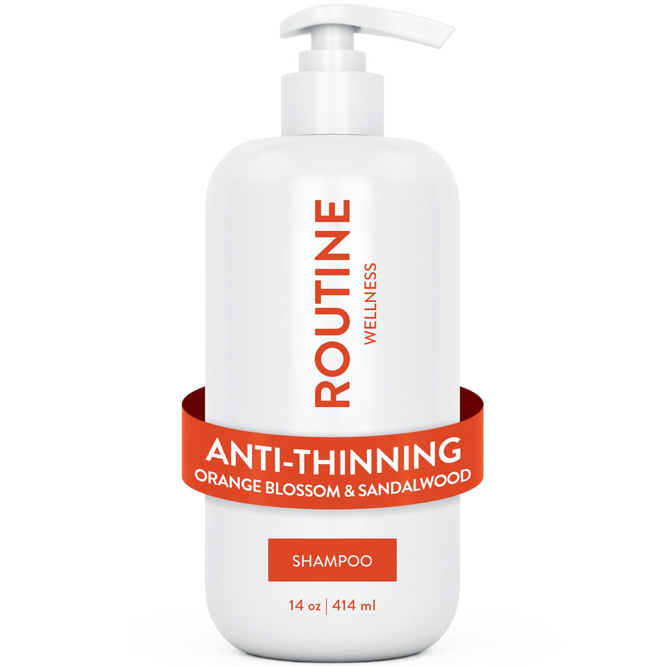 Routine Wellness anti-thinning shampoo bottle with orange blossom and sandalwood for fuller-looking hair.