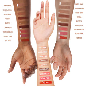 Ruby Kisses Broadway Vita-Lip gloss texture closeup showing lightweight gel feel.
