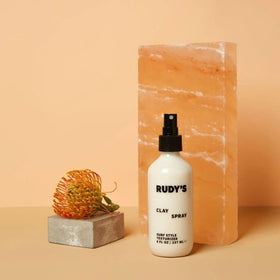 Rudy's Clay Spray volume-mist delivers light hold for lifted, bouncy hair.