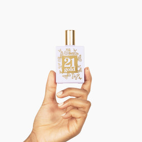 Rue 21 Gold packaging front view signaling chic fragrance for any look