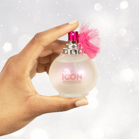 Rue 21 Icon EDP bottle with peach hue on vanity.