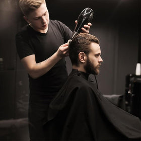 Run Pmy barber cape versatile for cutting, dyeing, and styling tasks.