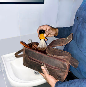 Rustic Town buffalo leather toiletry bag side handle for easy luggage access