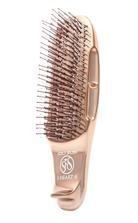 S-Heart-S magical scalp brush bristles provide gentle exfoliation for a refreshed scalp.