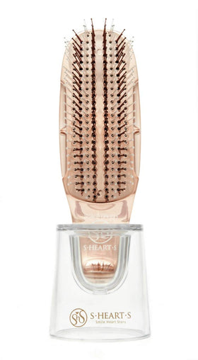 S-Heart-S scalp brush with durable nylon bristles supports long-lasting grooming.