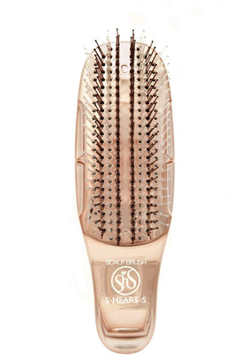 S-Heart-S scalp brush handle demonstrates ergonomic grip for easy use.