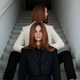 Hair shows subtle gloss and smoothness from SACHAJUAN Finish Cream.