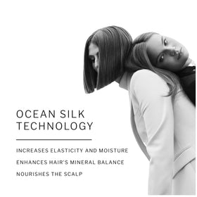 Hands applying SACHAJUAN Volume Cream to damp hair for definition.
